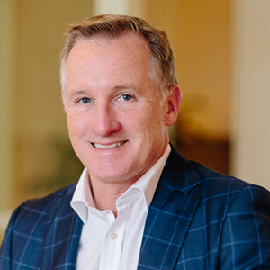 headshot John Sheehan