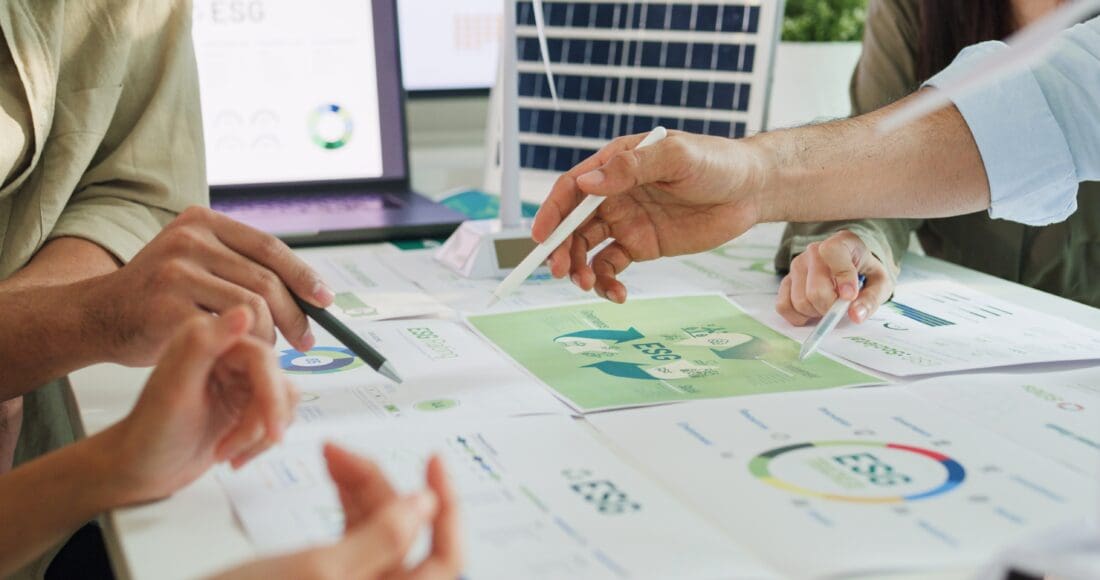 people analyzing reports