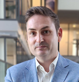 headshot Kris Hopkins